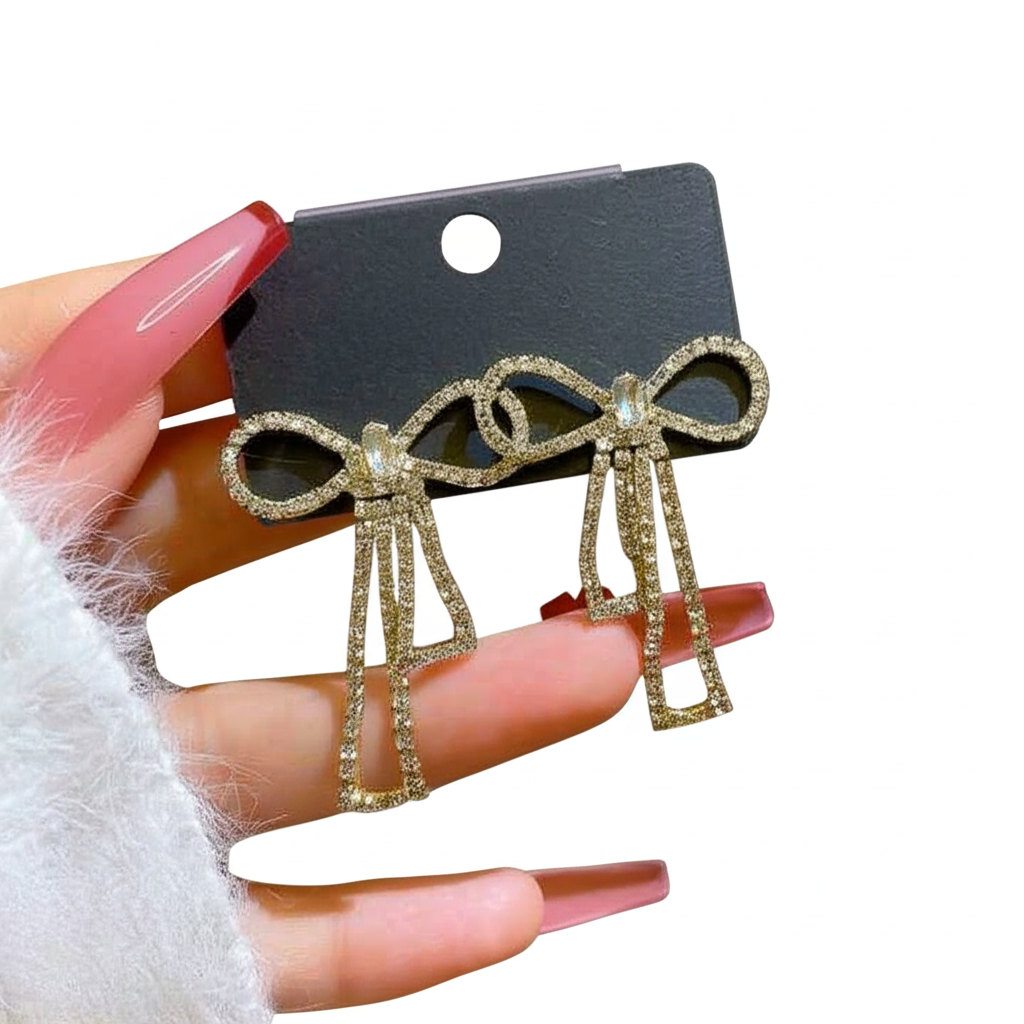 PQT-985 Touch Of Glamour To Your Look With These Bow Shape Zircon Korean Earrings Color Golden