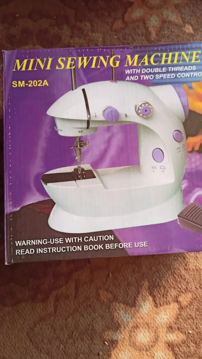 SM-202A Electric Mini Sewing Machine Double Threads & Two Speed Control for Home & Travel - Image 4